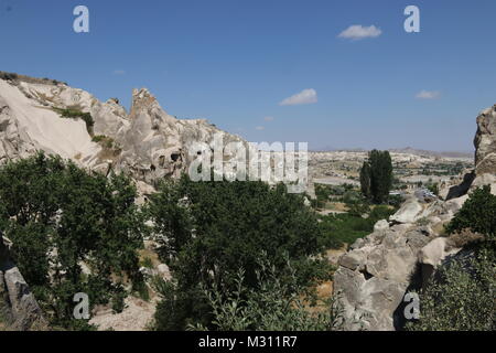 Les touristes qui visitent le parc national musée en plein air de Göreme, Cappadoce, Turquie Banque D'Images