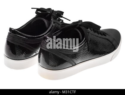 Chaussures de femmes noires avec des lacets sur les semelles blanches Banque D'Images