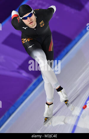 Gangneung, Corée du Sud, 11 février 2018. Patrick Beckert de l'Allemagne en action pendant les Jeux Olympiques d'hommes du 5000 m en patinage de vitesse dans l'Ovale de Gangneung en Crédit photo : dpa alliance/Alamy Live News Banque D'Images