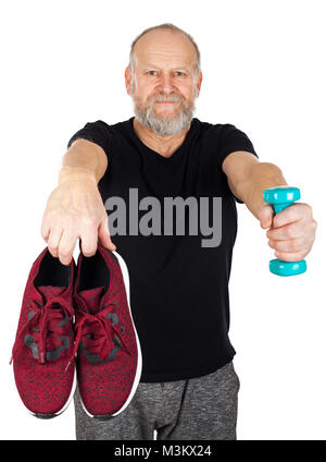 Handsome man haltère d'entraînement et chaussures - mode de vie sain Banque D'Images