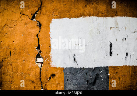 La texture du béton peinture blanche et orange, blanc et orange fond grunge mur de béton. Banque D'Images