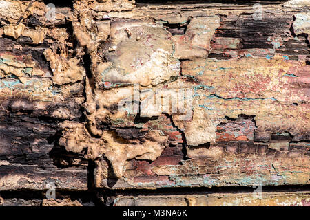 La texture de surface fissurée le bois brut peint Banque D'Images