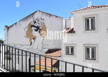 Fille sur un mur Banque D'Images