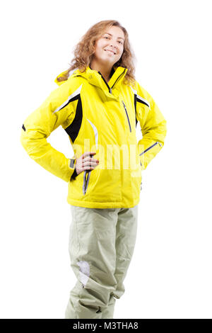 Skieur dans portrait femme veste jaune isolé sur fond blanc Banque D'Images