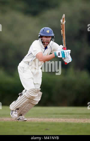 Batteur de cricket en action. Banque D'Images