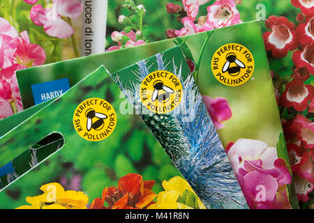 Paquets de graines colorées afficher RHS parfait pour les pollinisateurs logo abeille UK Banque D'Images