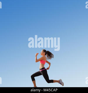 Composite Image de femme en bonne santé le jogging Banque D'Images