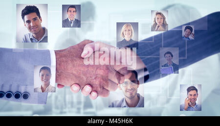 Image composite de business people shaking hands on white background Banque D'Images