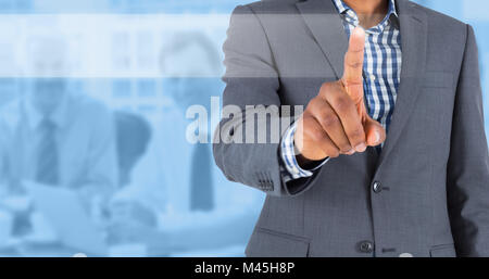 Composite image of businessman pointing Banque D'Images