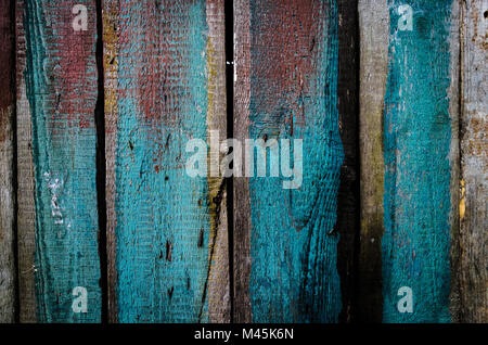 Grungy pealing bleu et rouge en bois peinture texture mur. Banque D'Images