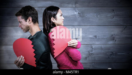 Composite image couple standing back to back Banque D'Images