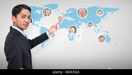 Image composite de stern asian businessman Banque D'Images