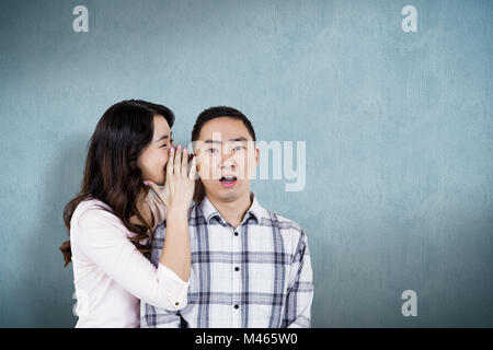 Image composite de woman whispering secret de mari Banque D'Images