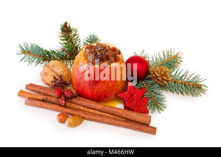 Pomme au four avec décoration de Noël isolé. Banque D'Images