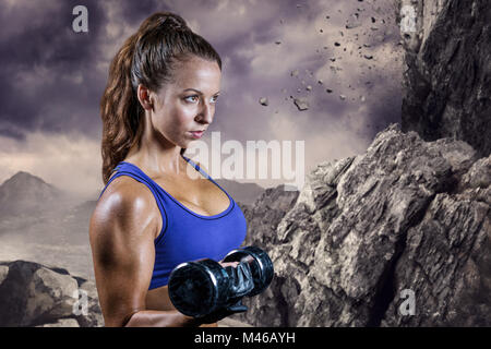 Composite image fit woman lifting dumbbell Banque D'Images