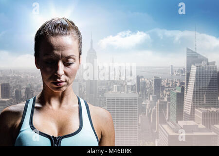 Image composite de triste femme athlète dans les vêtements de sport Banque D'Images