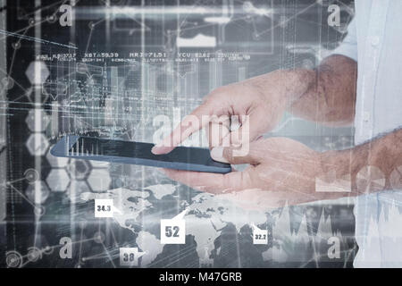 Image composite d'un man using tablet computer Banque D'Images