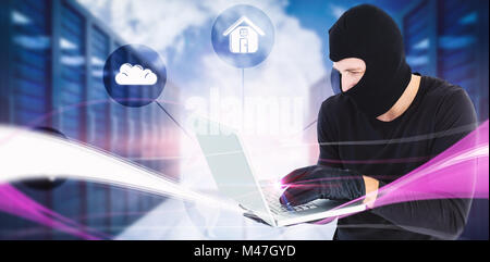 Composite image of burglar holding laptop permanent Banque D'Images