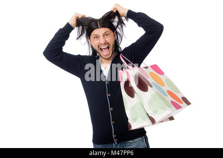 Jeune homme tenant des sacs en plastique isolated on white Banque D'Images