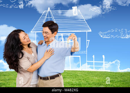 Portrait of couple holding un jeu de clés Banque D'Images