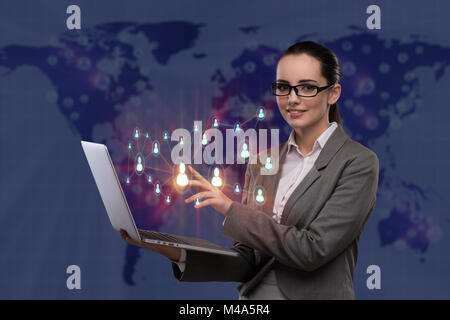 Businesswoman with laptop in social network concept Banque D'Images