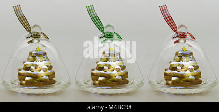 Biscuits de noël en forme d'étoile sous cloches de verre Banque D'Images