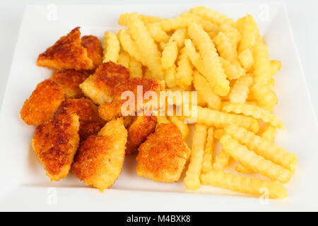 Nuggets de poulet avec frites Banque D'Images