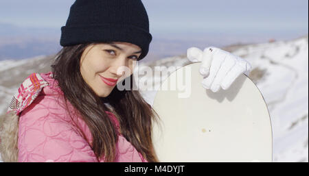 Belle asian girl with snowboard Banque D'Images