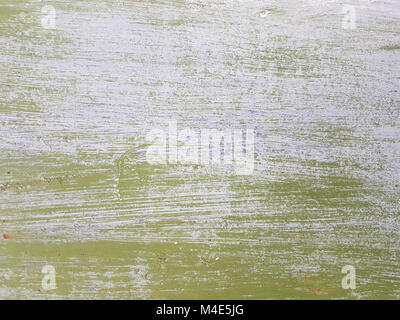 Abstract grunge texture suspecte l'ancienne surface du déplacement de fleurs vert et blanc, avec de nombreuses rayures horizontales. Banque D'Images