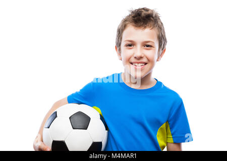 Handsome smiling child boy holding soccer ball Banque D'Images