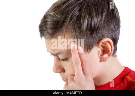 Young caucasian teenage boy avec une tête ache Banque D'Images