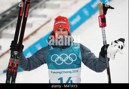 Pyeongchang, Corée du Sud. Feb 18, 2018. 18 février 2018, la Corée du Sud, Pyeongchang, Jeux Olympiques, le biathlon, le départ en masse, hommes, Alpensia Centre de biathlon : Simon Schempp (argent) de l'Allemagne. Crédit : Daniel Karmann/dpa/Alamy Live News Banque D'Images