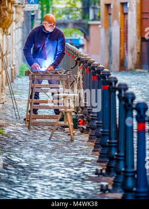 Soudure sur une rue de Rome, Italie Banque D'Images