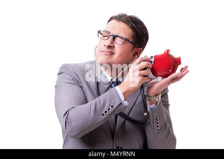 Businessman with stethoscope and piggybank zone blanche isolée Banque D'Images