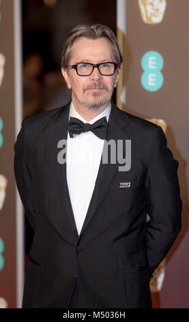 Londres, Royaume-Uni. Feb 19, 2018. Gary Oldman arrive à l'EE British Academy Film Awards, BAFTA Awards, au Royal Albert Hall à Londres, Angleterre, Grande-Bretagne, le 18 février 2018. - Pas de service de fil - Crédit : Hubert Boesl/dpa/Alamy Live News Banque D'Images