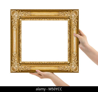 Cadre photo en bois dans les mains Banque D'Images