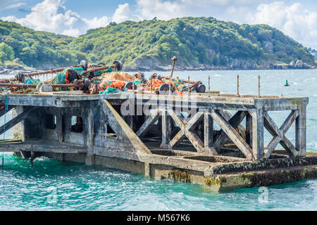 Mise en scène du port désaffecté, délabrée à Brixham Harbour, dans le sud du Devon, Royaume-Uni. Banque D'Images