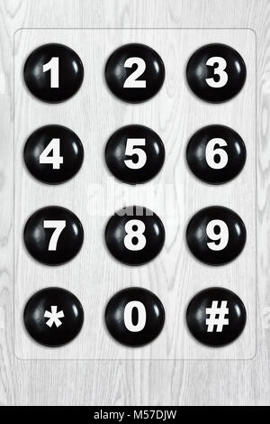 Clavier téléphonique sur la texture du bois blanc Banque D'Images