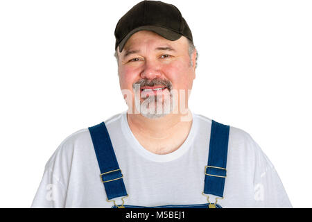 Portrait of smiling man wearing cap avec bébé contre fond blanc Banque D'Images