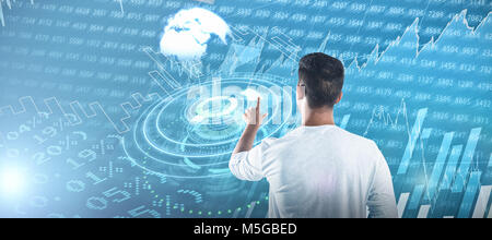 Image composite de l'homme semblant de toucher un écran invisible contre fond blanc Banque D'Images