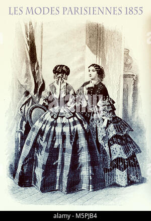 1855 vintage fashion, magazine français Les Modes Parisiennes présente deux jeunes femmes dans un beau salon avec fantaisie flounced jupes et élégant salon de Banque D'Images