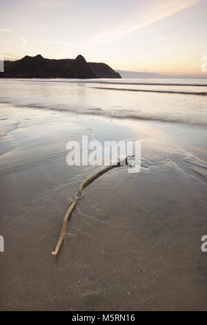 L'aube à trois falaises bay, Gower Banque D'Images