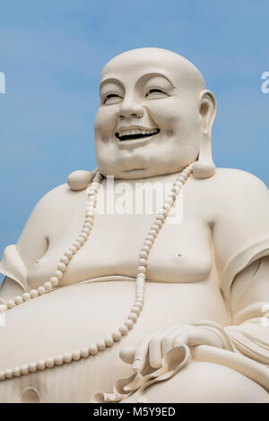 Bouddha assis statue au Temple Vinh Trang Ville à Mytho, Delta du Mekong, Vietnam Banque D'Images