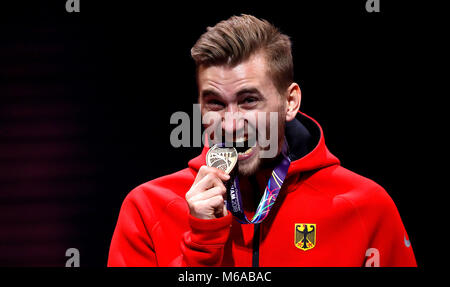 L'Allemagne Mateusz Przybylko célèbre avec sa médaille de bronze après avoir terminé 3e de la mens Saut au cours de la première journée du Championnat du Monde Indoor de l'IAAF 2018 à l'Arena Birmingham, Birmingham. ASSOCIATION DE PRESSE Photo. Photo date : Jeudi 1 mars 2018. Voir l'histoire de l'ATHLÉTISME Indoor PA. Crédit photo doit se lire : Martin Rickett/PA Wire. Banque D'Images