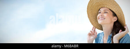 Image composite de portrait de belle blonde women wearing hat Banque D'Images