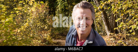 Image composite de close-up portrait of smiling man Banque D'Images