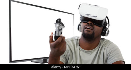 Image de l'homme composite à l'aide de casque de réalité virtuelle et jeux vidéos Banque D'Images