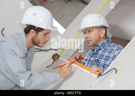 Travailleur de la construction et de l'architecte de parler Banque D'Images