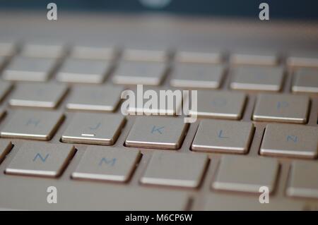 Clavier d'un ordinateur portable de couleur bronze Banque D'Images