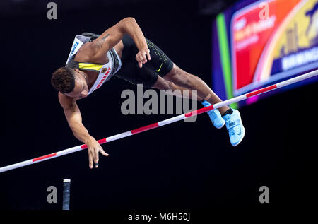 Birmingham, UK. 4e Mar, 2018. : Championnats du monde en salle. Raphael Holzdeppe l'Allemagne en compétition dans le saut à la perche. Photo : Sven Hoppe/dpa dpa : Crédit photo alliance/Alamy Live News Banque D'Images